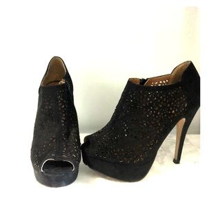 Black Size 7.5 zip up platform bootie